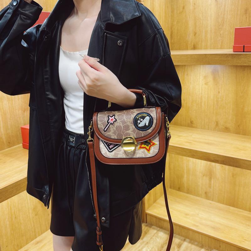 Bag women's new women's bag hot-selling contrasting color handbag badge decoration shoulder small square bag tide