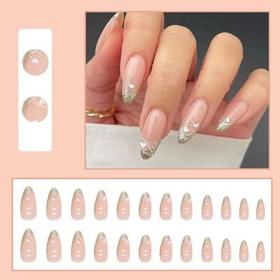Gloss & Go 24 Reusable Artificial Fake Nail Set| Peach Color With Golden Zari And White Heart Design Almond Glossy Nails| Lightweight & Long Lasti