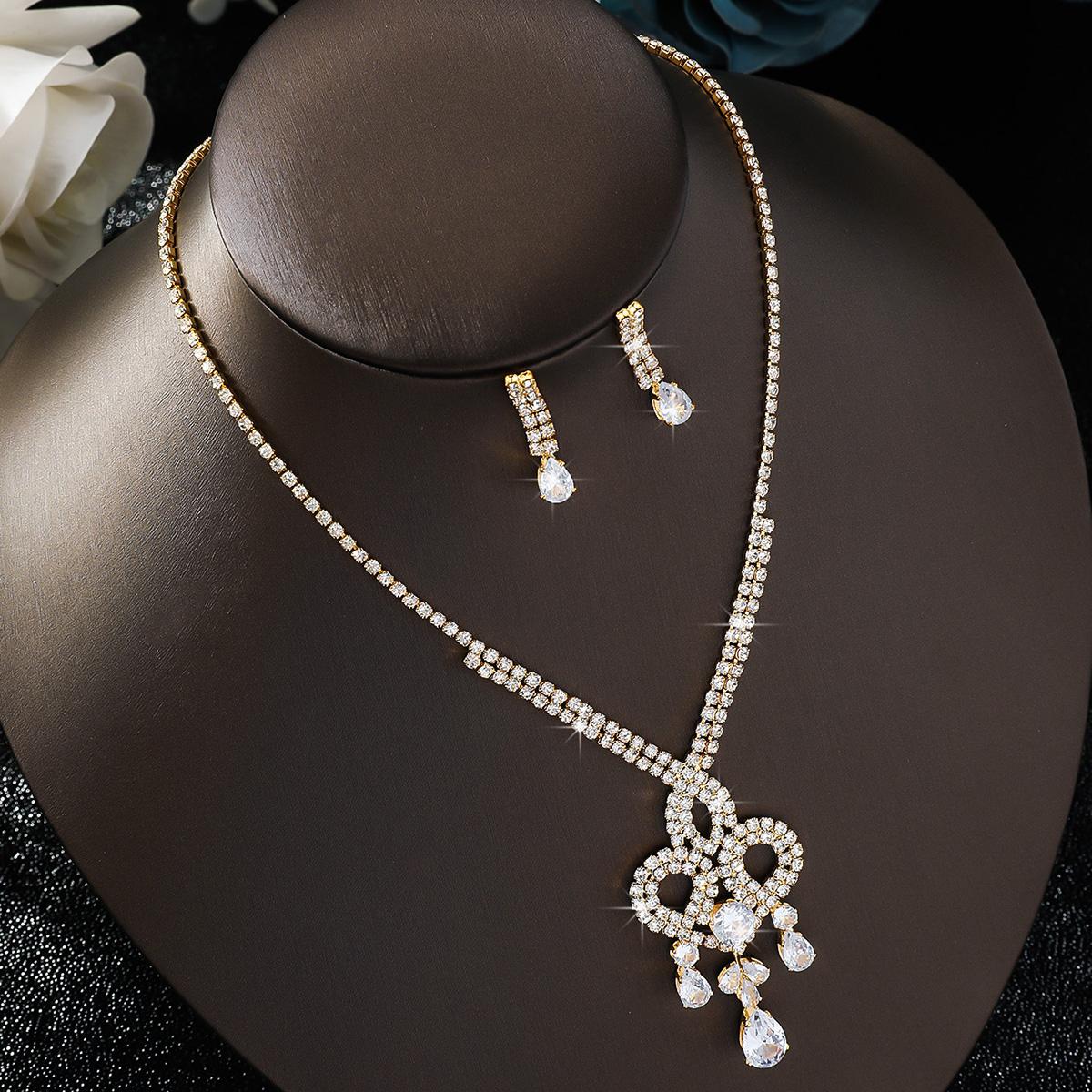 

Набор из 3 предметов: женское модное медное ожерелье-цепочка с бриллиантами в виде когтей и подвеской в виде капли воды, а также серьги, подходит для свадьбы, вечеринки, фестиваля, в качестве подарка