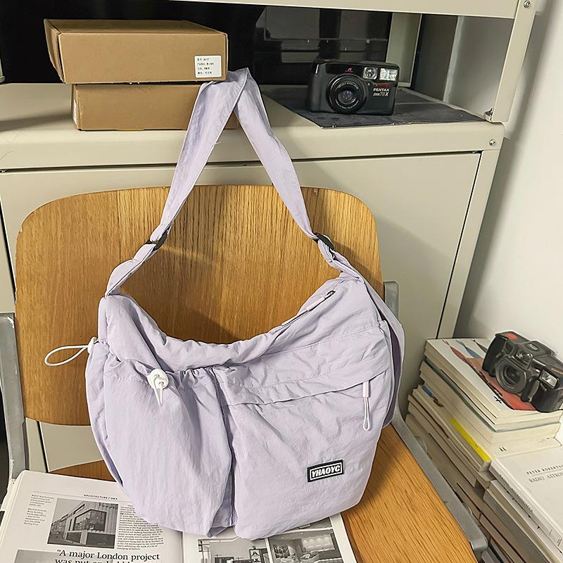 

Fashion trend casual simple foreign style personality large capacity bag 2025 summer new women s shoulder messenger bag фиолетовый