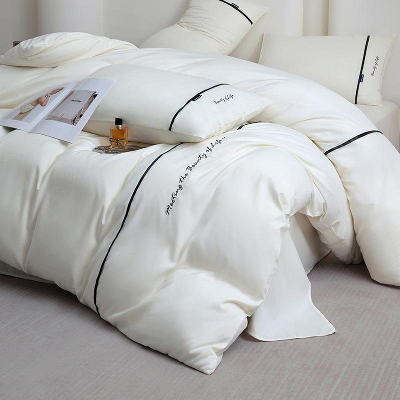 2025 new solid color embroidered ribbon double-spell skin-friendly washed cotton 4-piece set bed sheet and fitted sheet style