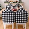 And Cozy Black White Checkered Christmas Chair Slipcover With Stylish Pom Poms For Holiday Atmosphere