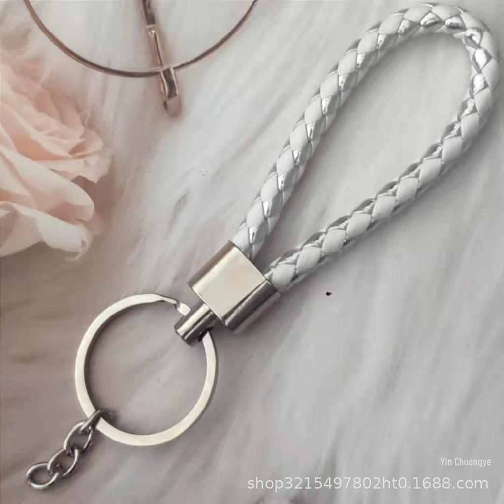 Gevlochten Lederen Touw Sleutelhanger met Poppenhanger - Modieus en Creatief Accessoire