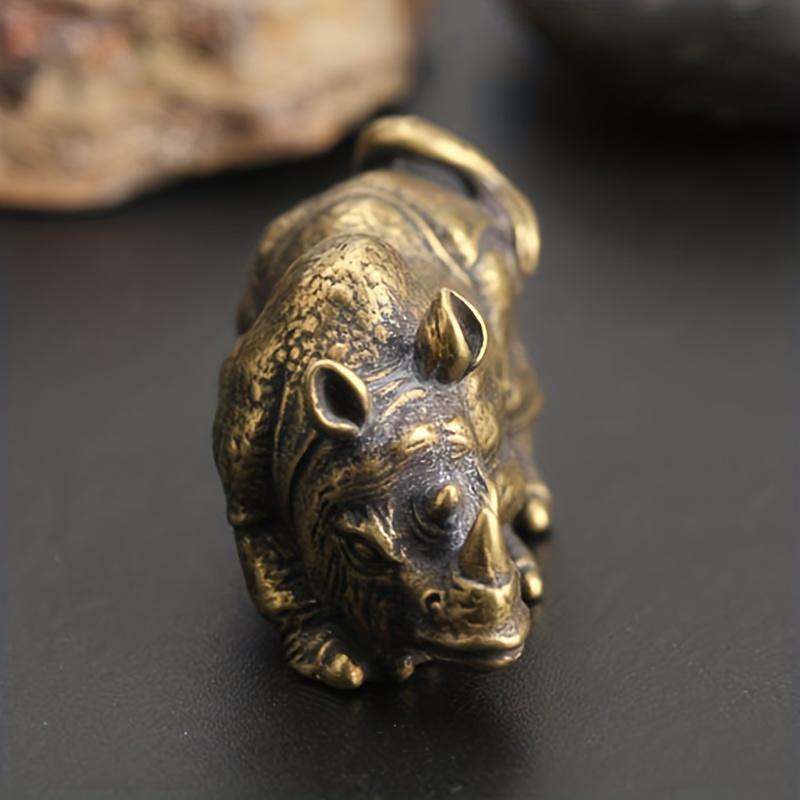 1Pc Exquisite Vintage Brass Rhino Figurine - Handcrafted Miniature Sculpture Ornament for Interior Home Decor with Copper Accents and Unique Carving
