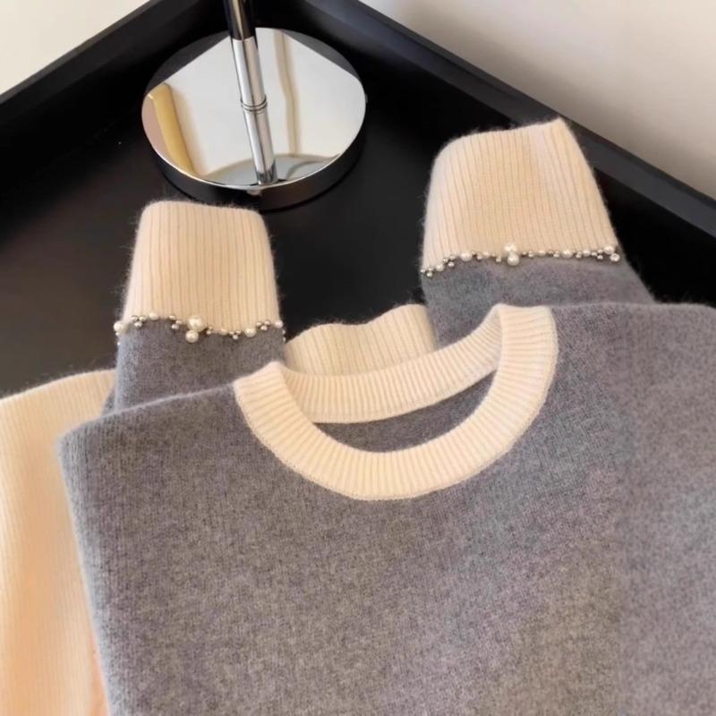 Fauler Wind lockerer Farbblock-Pullover Pullover Damen Herbst und Winter Design-Sinn Nische Bündelmanschetten Perlen