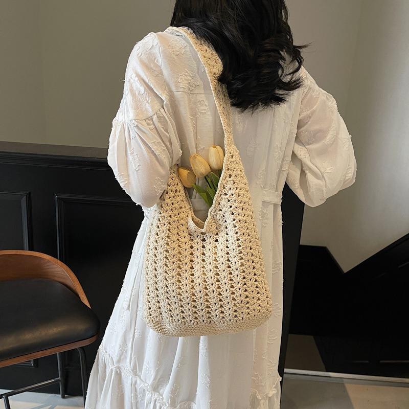 Woven bag women's large-capacity new casual shoulder armpit bag knitted seaside vacation beach bag