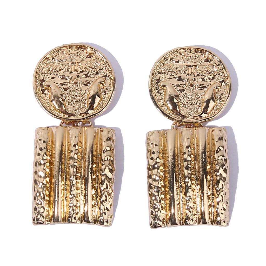 

Contemporary Geometric Gold Metal Earrings With Relief Design For Collectors