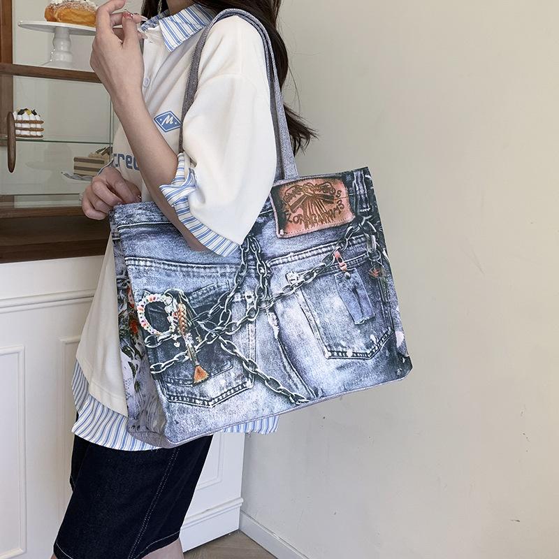 Frühling und Sommer neue Retro Denim Kontrastfarbe tragbare Umhängetasche große Kapazität Tragetasche Einkaufstasche Damentasche