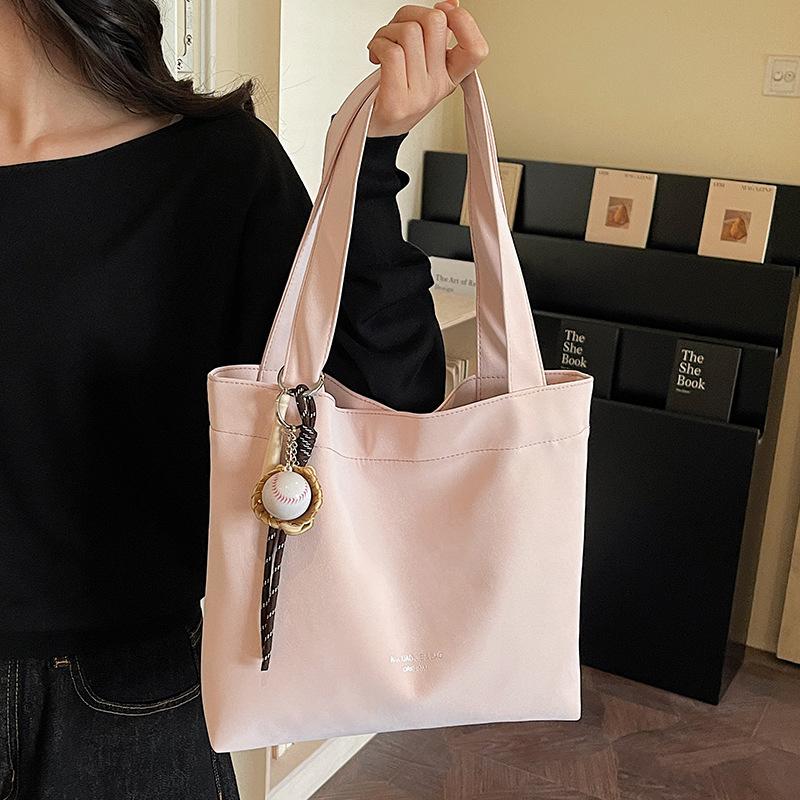 Handbag for Convenient Commuting To Work. High-end and Fashionable Handbag for Storage. Fabric Bag.