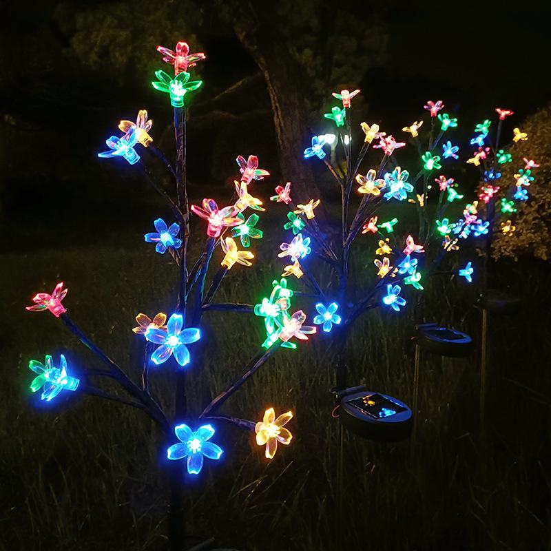 Colorful/warm light solar-powered cherry blossom branch ground light, suitable for outdoor gardens, patios, lawns, and walkways.