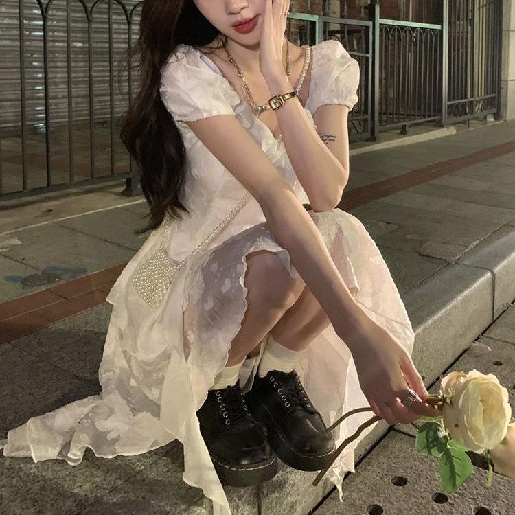 French temperament first love white dress women's summer new waist and thin pure desire ruffle edge irregular skirt