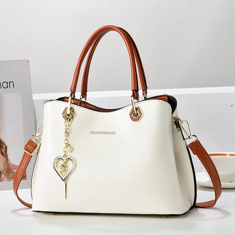 

Новые модные кожаные женские сумки, трендовые женские сумки через плечо, большая вместимость, дизайнерские портативные женские сумки с верхней ручкой