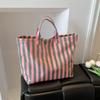 This Water-Resistant Pvc Tote Bag Features A Pink And Blue Striped Design, A Large Capacity, And Is Suitable For Beach Shopping,