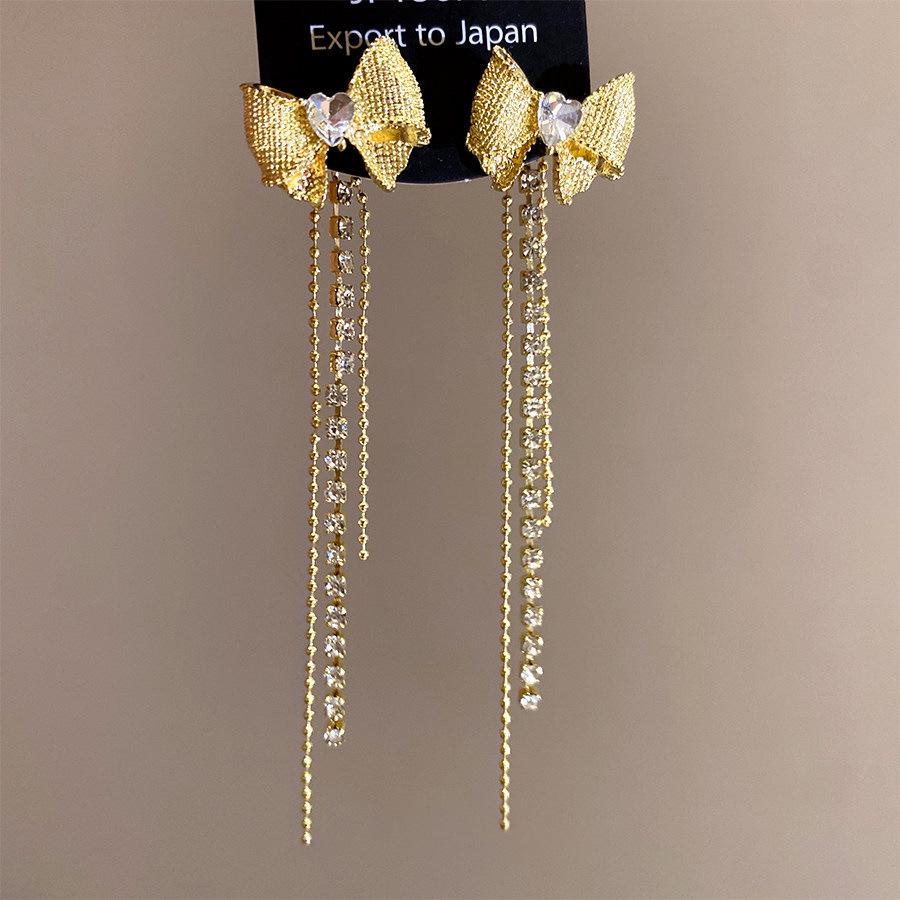 "925 Silver Long Tassel Zircon Bow Earrings for Women - Light Luxury & Versatile Design"