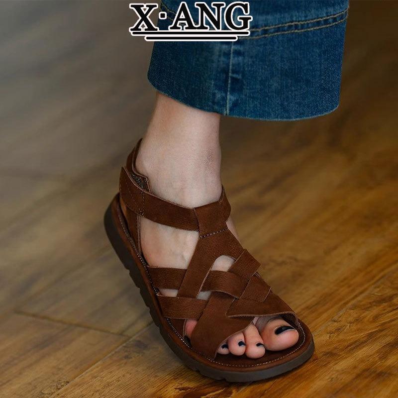

The first layer of cowhide hand-woven hollow soft-soled sandals women s new summer flat-soled retro women s shoes 40