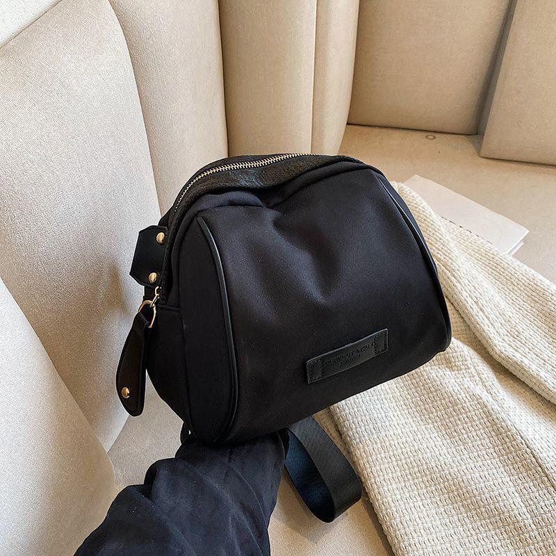 Nylon cloth bag women's 2025 new niche design shell bag lightweight versatile large-capacity messenger bag