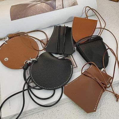 Magnetic Neck Hanging Glasses Holder: Multifunctional PU Leather Storage Bag for Outdoor Travel and Hats.