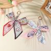 Porte-clés nœud papillon ruban élégant coréen écharpe en soie douce porte-clés porte-clés de voiture breloques de sac pour femmes accessoires de clés pour cadeaux de fille