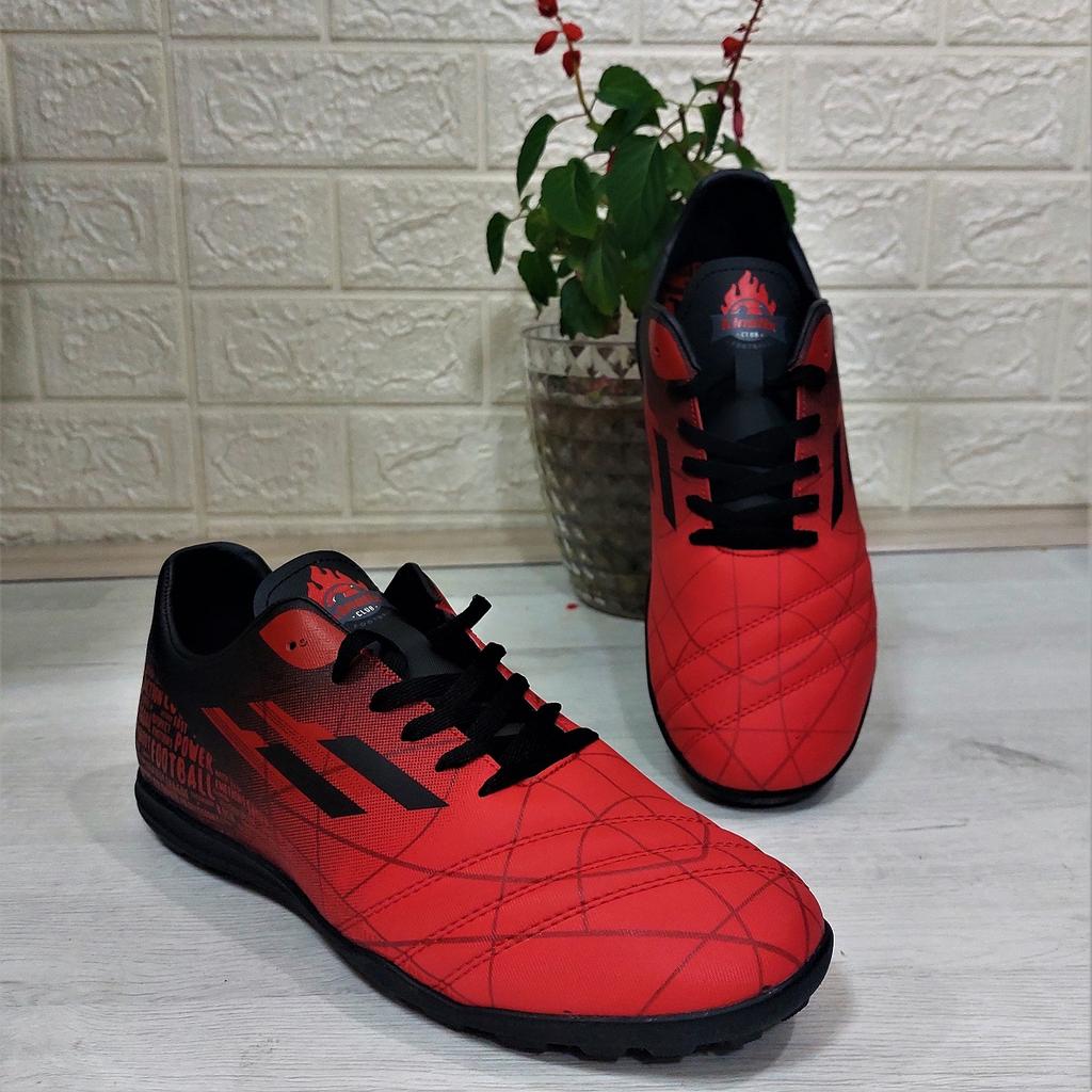 Kinetix Cross TF Rot-Schwarze rutschfeste Kunstrasen-Fußballschuhe