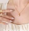 Gold-Plated Titanium Steel Cuban Chain Necklace with Freshwater Pearl Irregular Pendant.