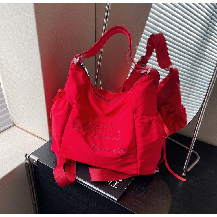 Tote bag women's 2024 new large-capacity commuting letter foreign feeling college students commute to class shoulder backpack