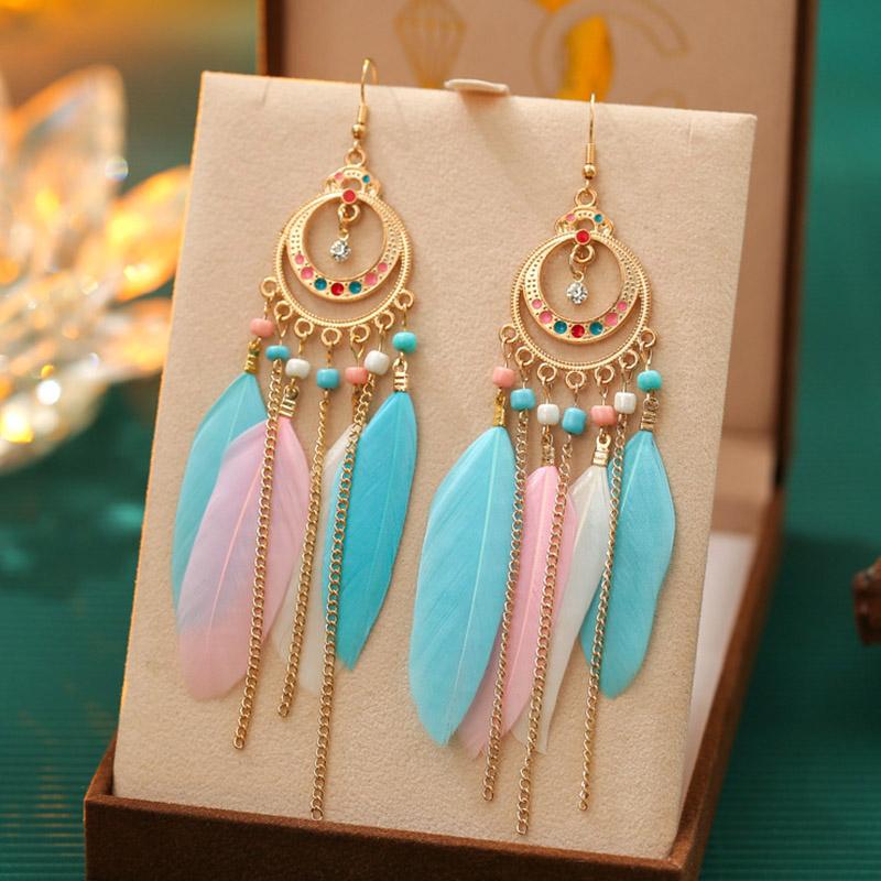 

Classic Bohemian Ethnic Feather Earrings for Women Fashion Long Rice Bead Gold Color Chain Dangle Earring Vacation Party Jewelry
