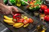 GLASS CUTTING BOARD 52x40 BANANA