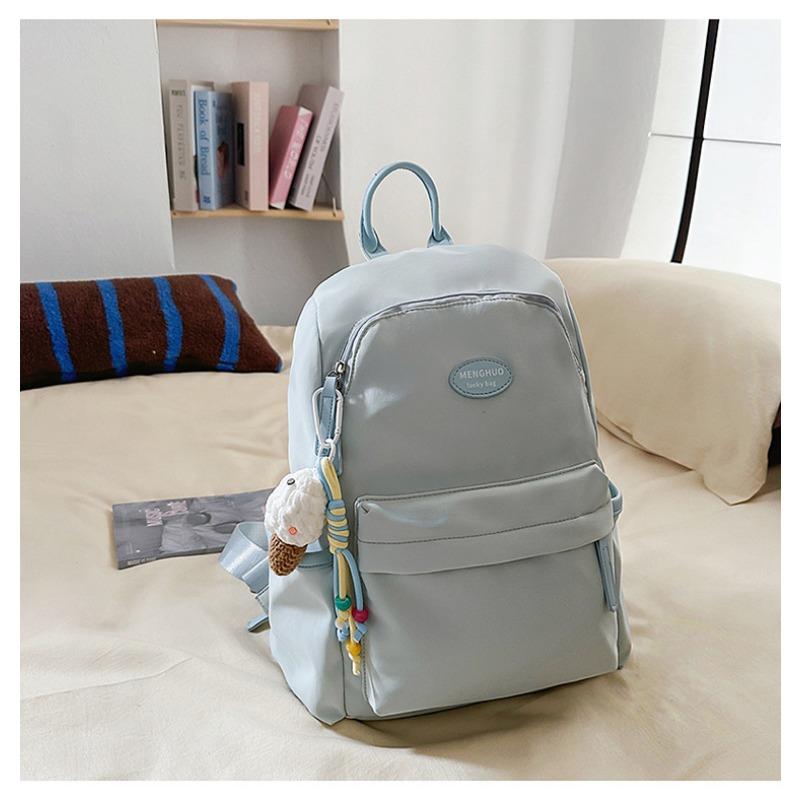Fresh and sweet candy color backpack for junior high school students, solid color, simple and large-capacity backpack.