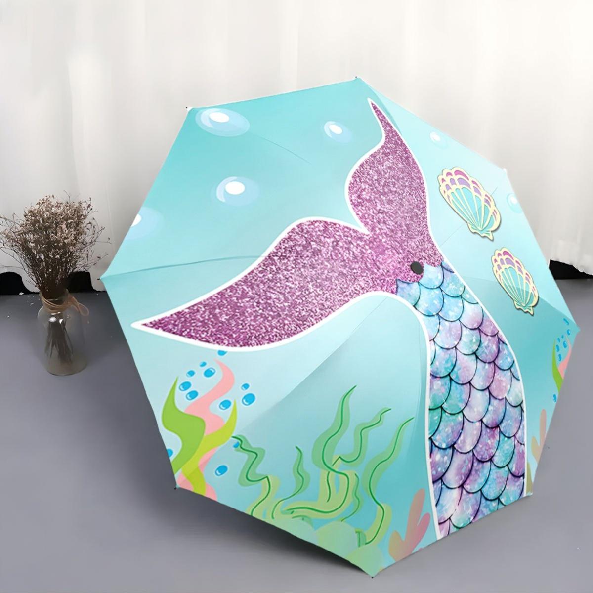 This Compact Umbrella Showcases a Design with a Mermaid S Tail, Seashells, And Bubbles. Perfect for Travel, Backpacks, Or As a