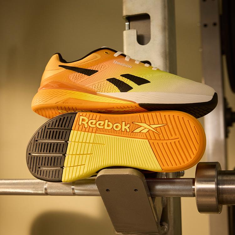 Reebok Nano X5 Unisex Black Chalk Electric Amber 100209367
