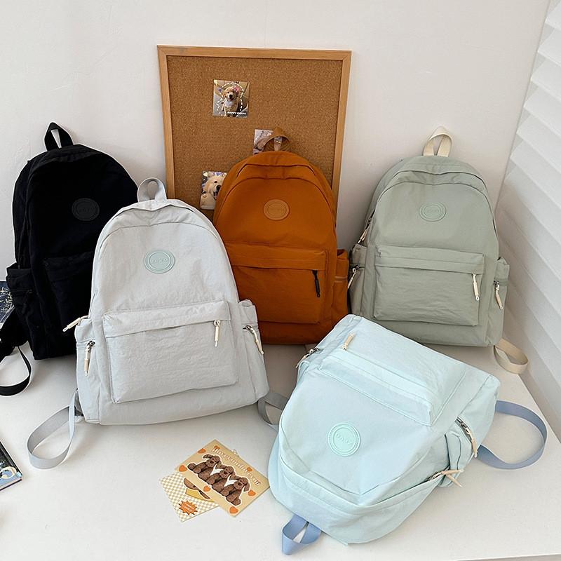 Fashionable Outdoor Ladies Backpack With Alphabet Decoration And Solid Color Design For Commuting