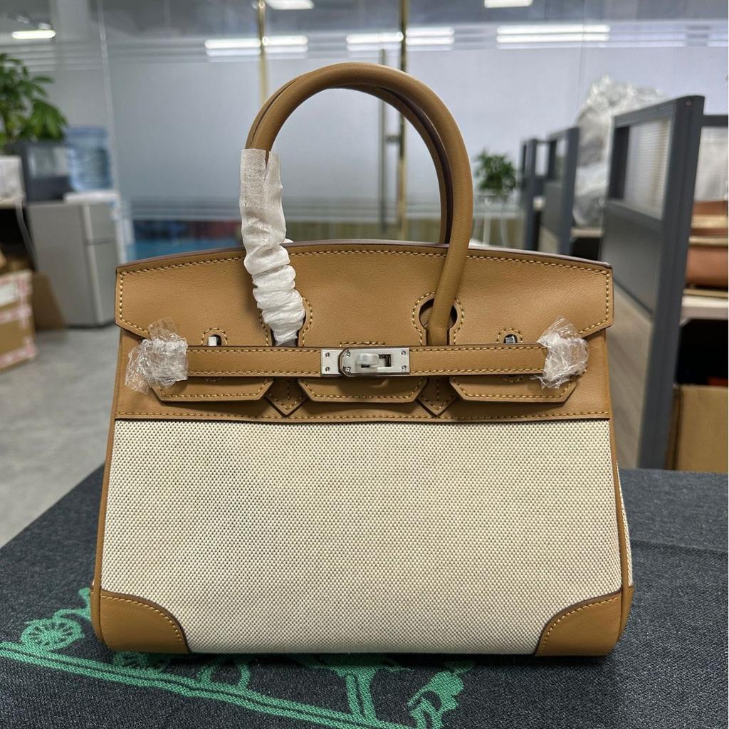 Grensoverschrijdende middeleeuwse 25cm30cm koeienhuid canvas damestas met lange schouderband forens casual leren schouder