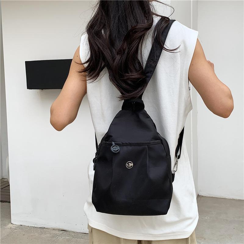 

Travel backpack women s new breast bag light commuter messenger bag sports shoulder mountaineering small backpack чёрный