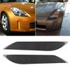 Pár ozdobných lišt na obočí světlometů z uhlíkových vláken se hodí pro Nissan 350Z 20032009