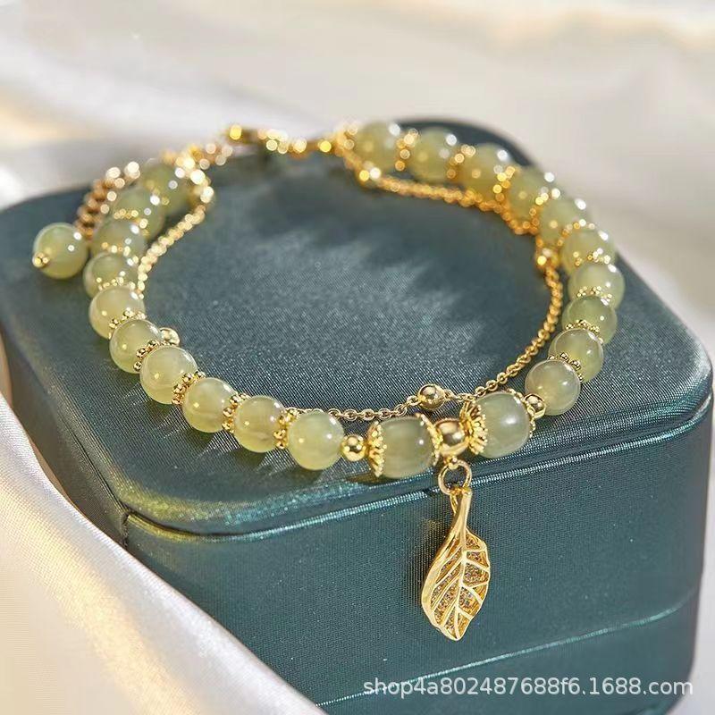 Hetian Yu golden branches and jade leaves student girlfriend bracelet light luxury niche design simple and versatile white gifts