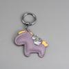 Instant Wealth Leather Keychain with Cartoon Pony Pendant for Couples – Trendy Bag and Car Accessory