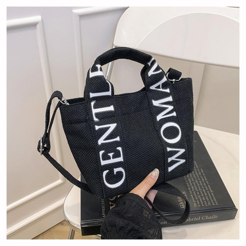 

Canvas handbag New letter large capacity multi-pocket shoulder bag Men s and women s messenger tote bag чорний
