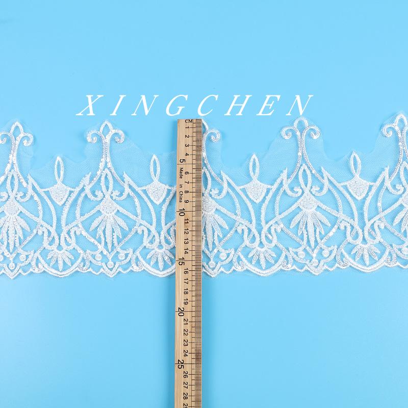 

Ширина 16 см Кружево Кружево Свадебное платье Бисерное кружево Бисерная вышивка Сетка Низ Вышитая кружевная ткань White/Bead/Width 16CM