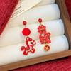 Flocked Hanzi Asymmetrical Red Lion Earrings - Luxurious New Year Design