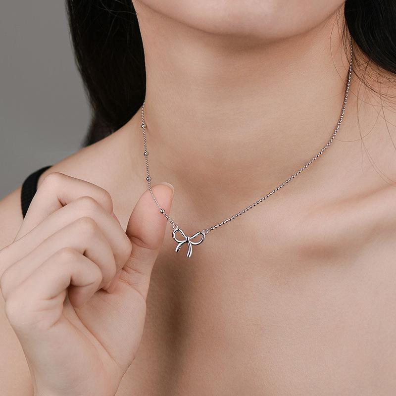 Sweet Hollow Bow Necklace Asymmetric Chain Necklace New Style