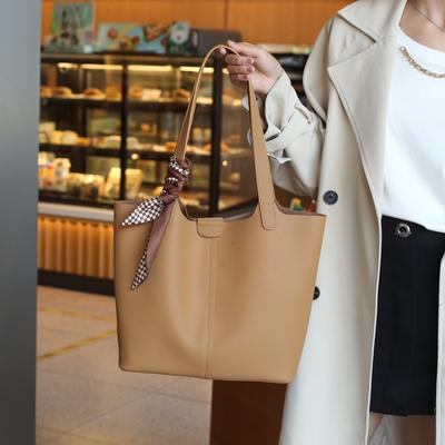 Sac cabas en cuir véritable Texture de haute qualité Sac à bandoulière pour femme Bretelles larges Ne fatigue pas Cuir de vache Sac mère et enfant