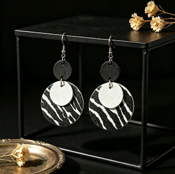 Elegant Leather Earrings with Geometric Zebra Print