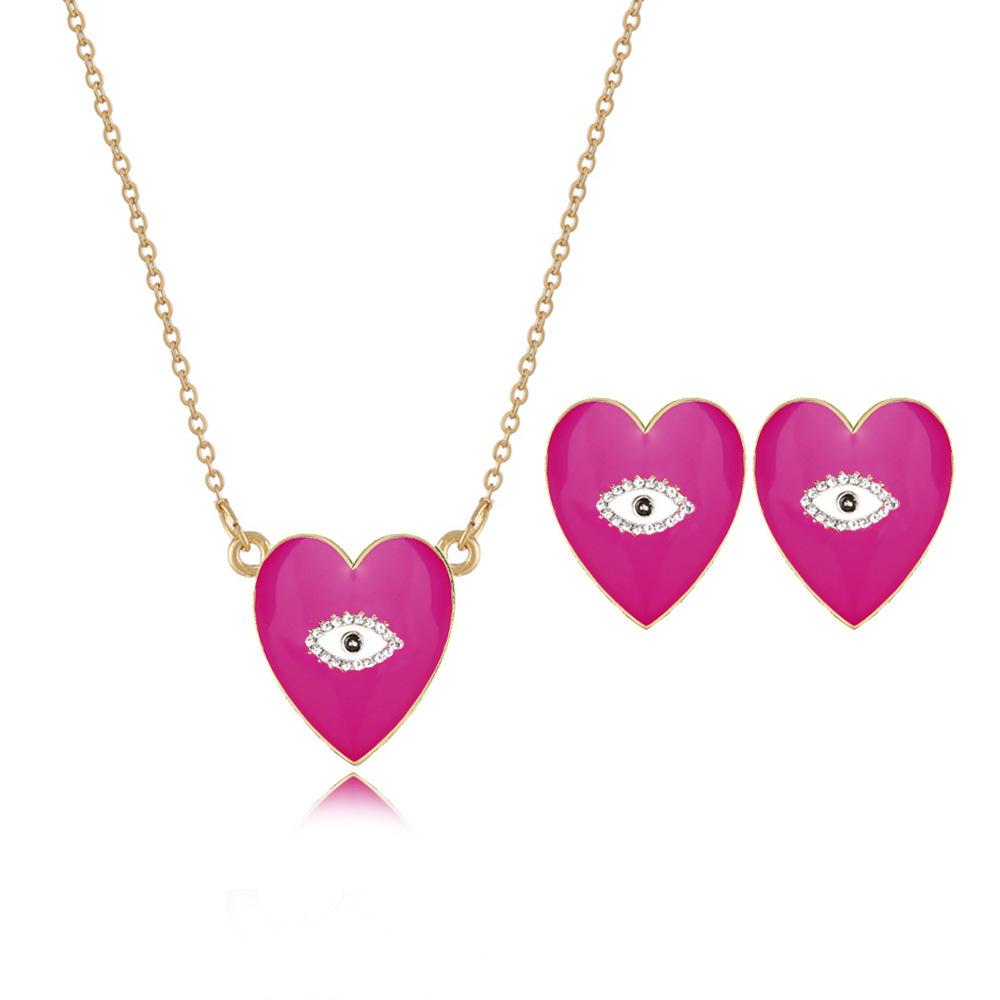 

Style European Creative Heartshaped Eye Earrings With Stunning Rhinestone Accents фуксія