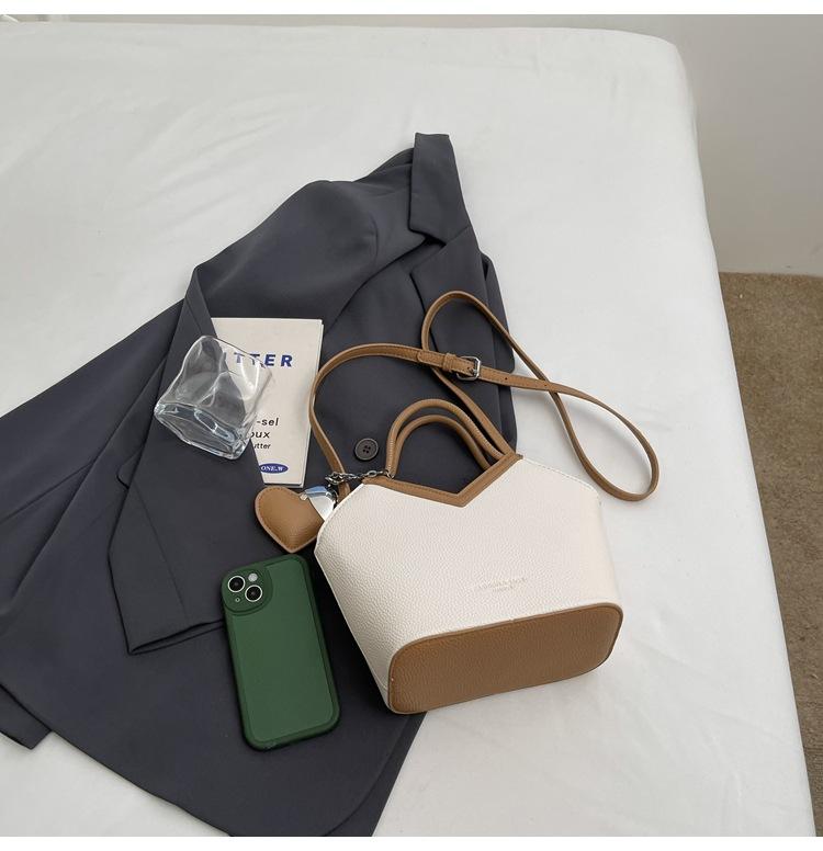 

Retro fashion PU contrasting color underarm bucket bag 2025 autumn and winter new trendy texture commuter shoulder messenger bag