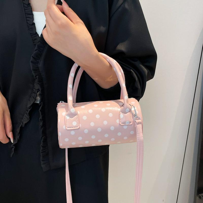 Niche polka dot bag women's 2025 new fashionable versatile underarm messenger bag exquisite portable small bag cylindrical bag
