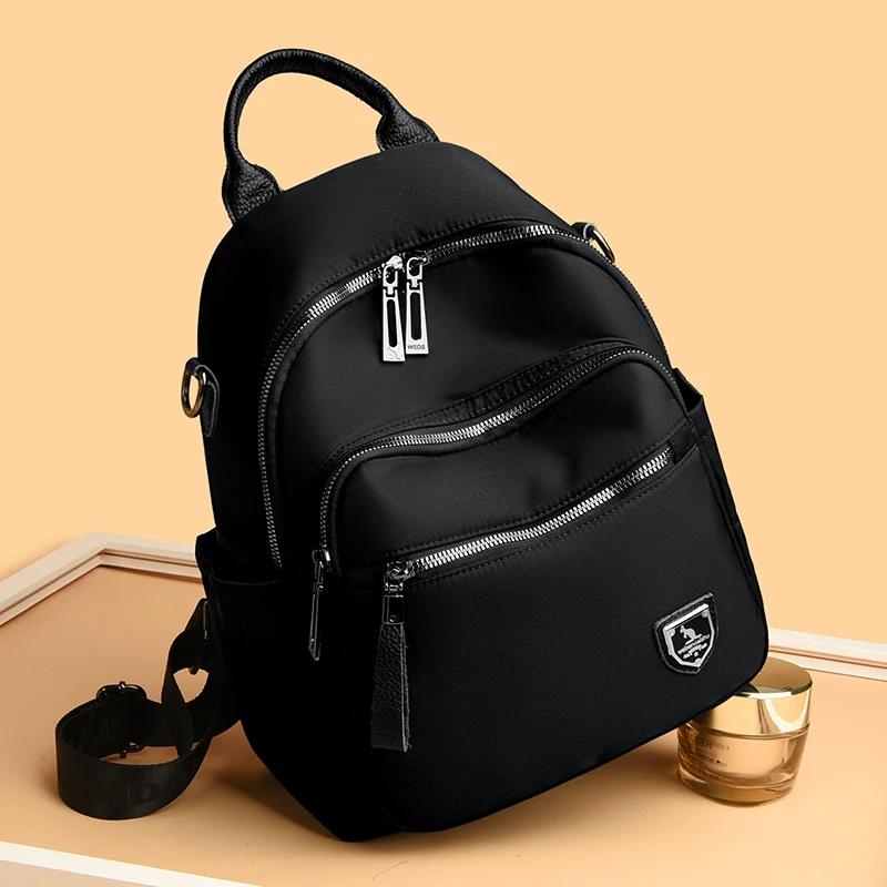 Neue Damen Luxusmarke Reise-Rucksäcke Lässige Wasserdichte Oxford Schultertaschen Weibliche Mode Große Kapazität Handtaschen Rucksack