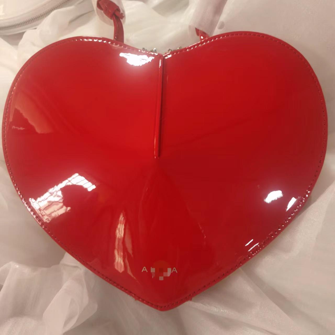 

Трендовая сумка Love Bag в форме сердца из натуральной кожи персикового цвета 2024 года — высококачественная маленькая сумка через плечо и через плечо 21x2x19 cm