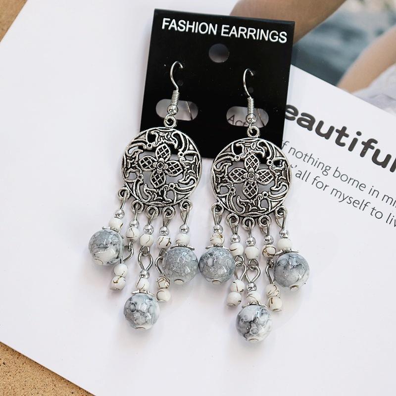 Retro Elegant Hollow Long Fringed Earrings Women's Simple Temperament Versatile Earrings Personalized Earrings