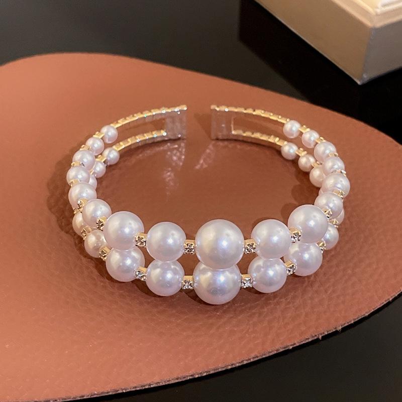 Bracciale rigido con doppio strato di perle simulate per donna, delicato gioiello da festa