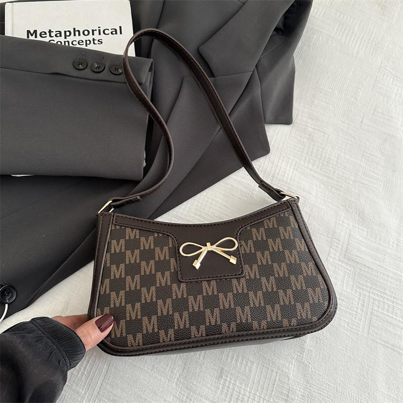 

Текстурированная универсальная маленькая сумка подмышкой женская сумка 2025 новая модная портативная сумка через плечо иностранный стиль сумка-багет